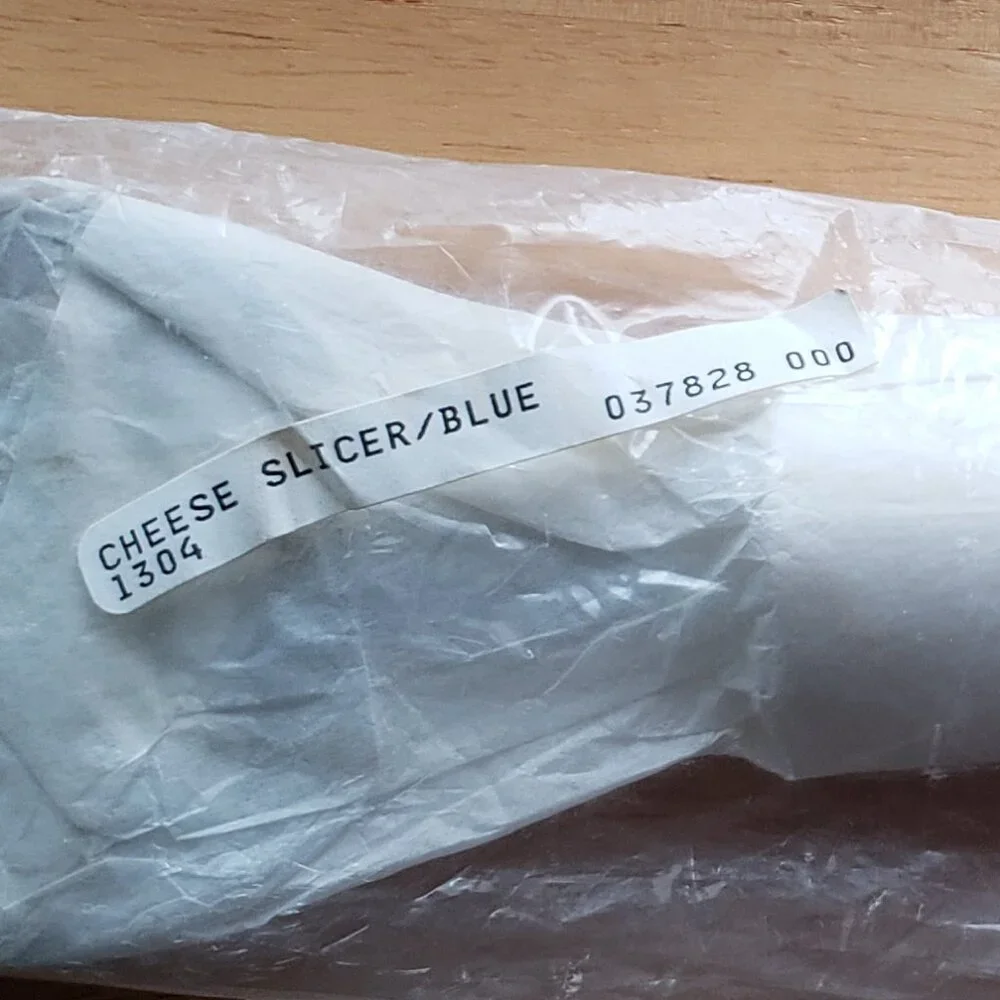 NWT Tupperware cheese plane/slicer blue
